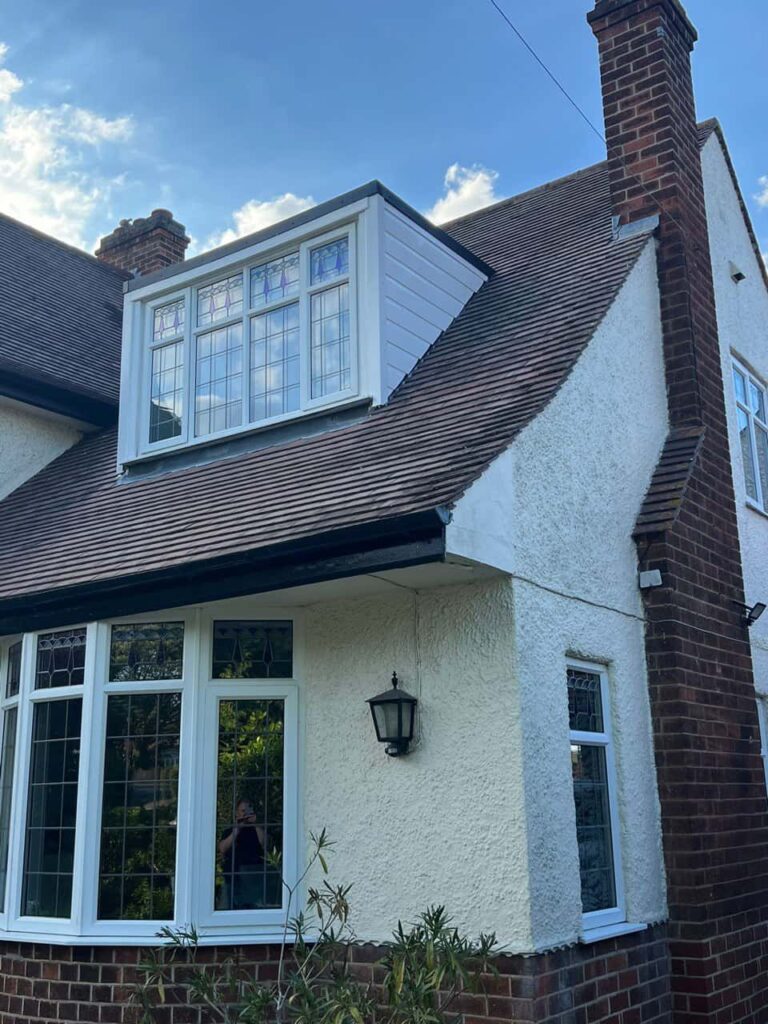 This is a photo of a dormer window which has just had some repairs carried out where the roof and the dormer meet. Works carried out by March Roofing Repairs